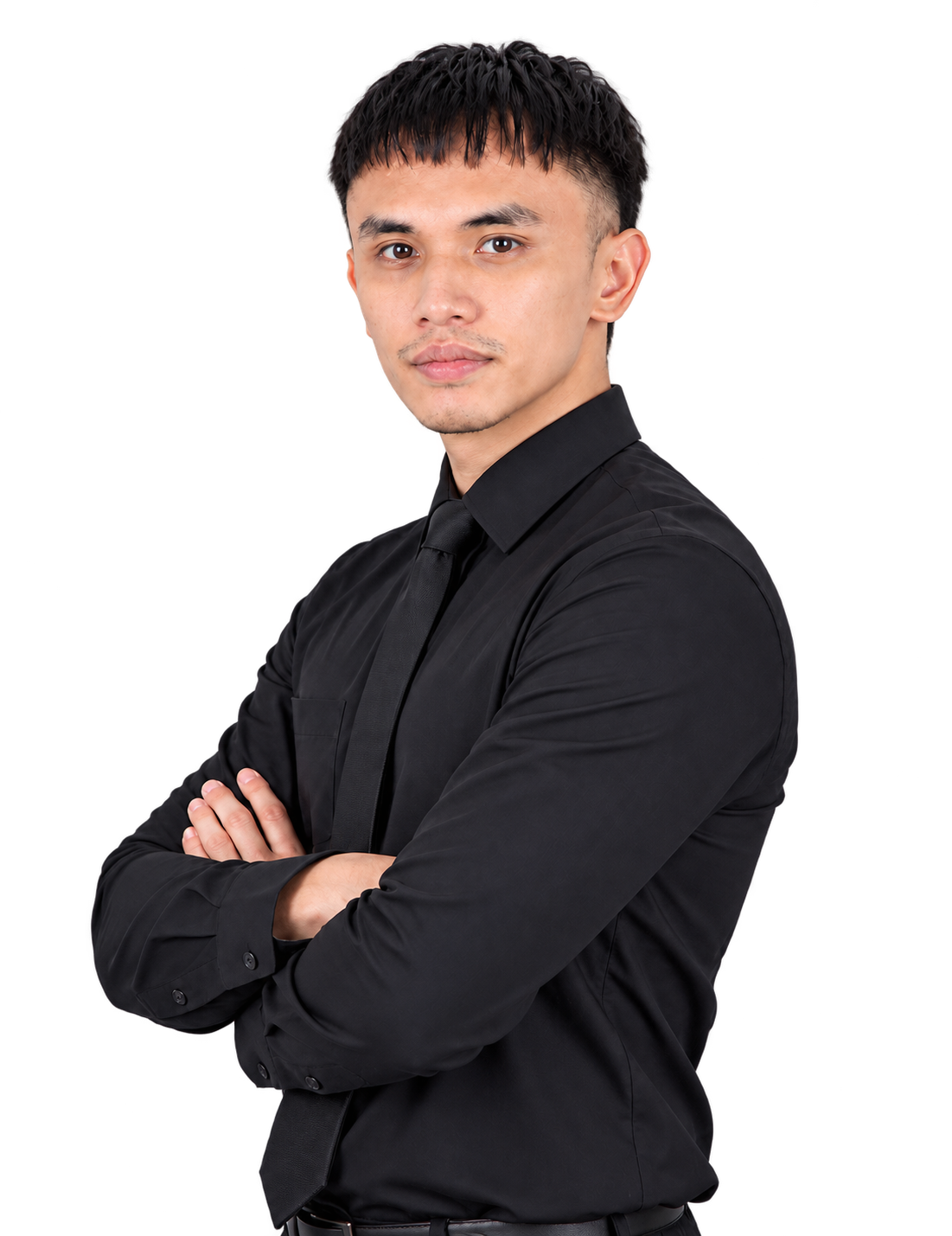 Kyle Matthew M. Reynoso wearing a black shirt and tie, with arms crossed